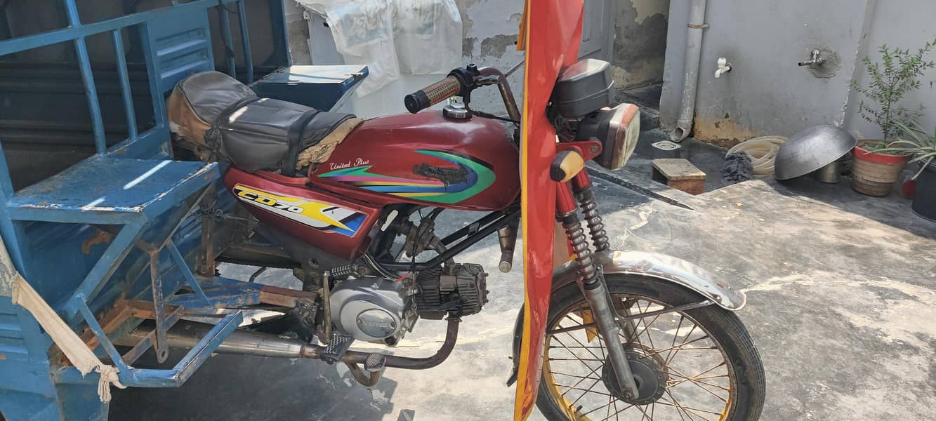 یونائیٹڈ لوڈر رکشہ 1