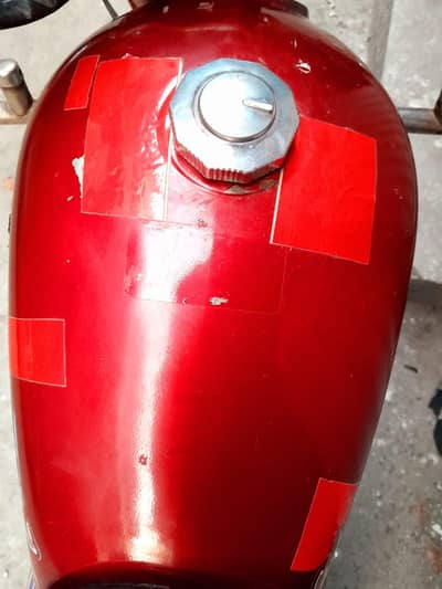 Honda CD 70 2010 model janiun Tanki tapay hain