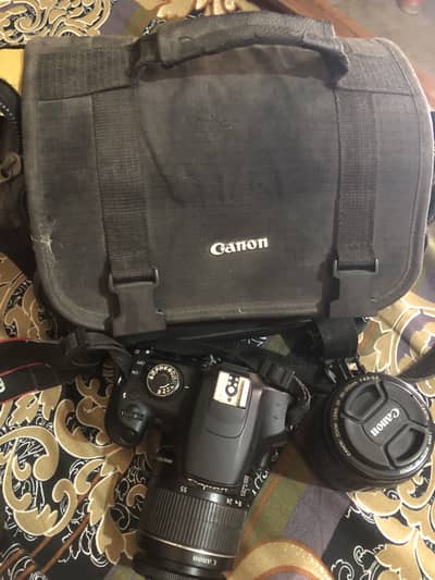 Canon EOS rebel T5 camera with extra wide range lens