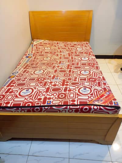 single wooden bed with original molty foam mattress