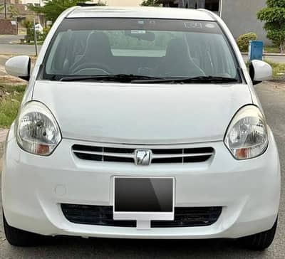 Toyota Passo 2012/15 pearl white  karachi Reg