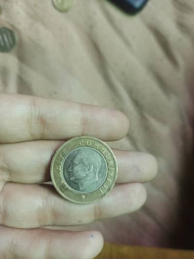 1 Turkish Lira and 50 fils of UAE dirham