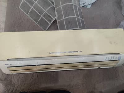 Mitsubishi 1 tone Air conditioner working ma ha