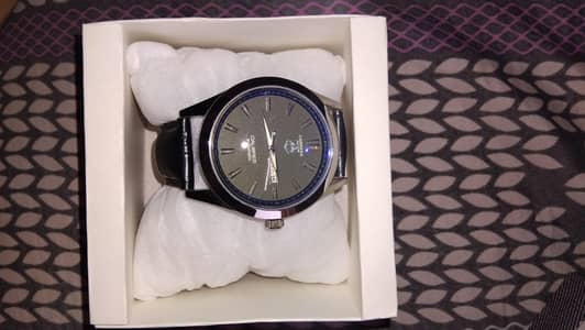 day and date watch in good condition and only 2 months old