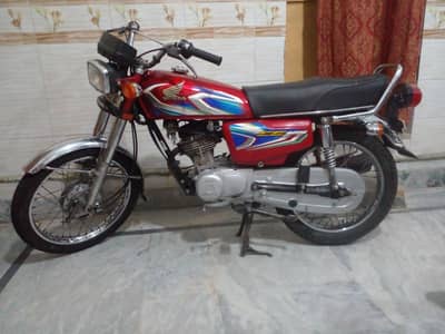 Honda 125  in original condition very good sound with biometric