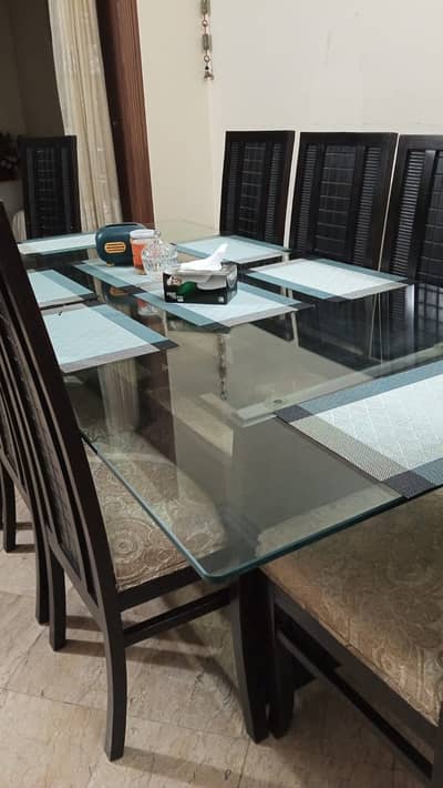 Double glass dining table of 8 in very good condition