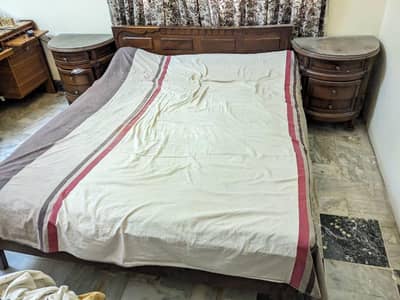 used bed and 2 side tables