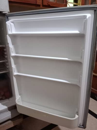 double door refrigerator full size in excellent condition,all genuine