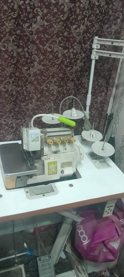 over lock machine ready for sale