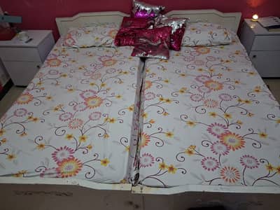 Two single diyaar wood solid beds with two side tables
