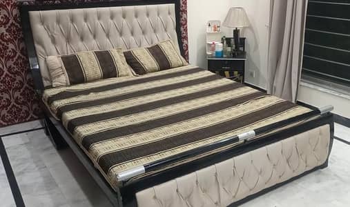 Bed with side tables
