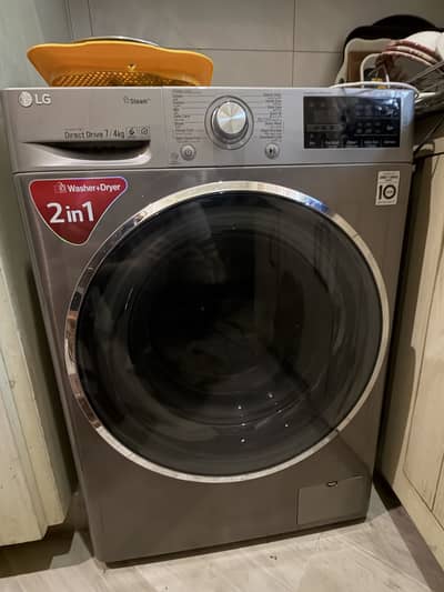 LG Fully Automatic Front Load Washer + Dryer with steam - 7kg