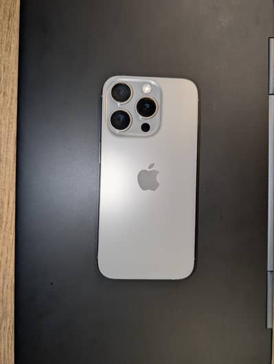 iPhone 15 Pro with original charger and cable 10/10 condition