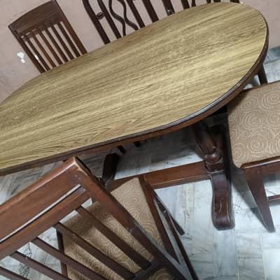 Dining table with five chairs