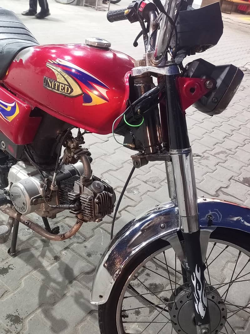 United 70cc 5