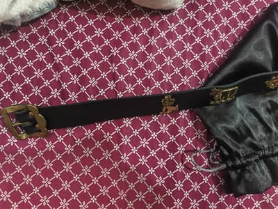 traditional leather swiss Alpine metal motifs in brass.