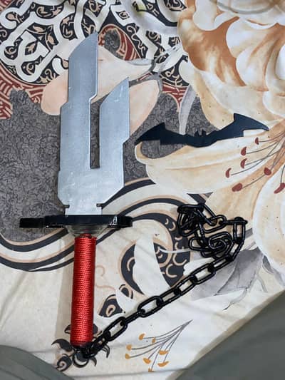 toji spare of heaven with batman symbol both made of iron