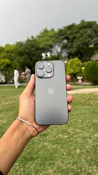 iphone 15 pro with minor dot