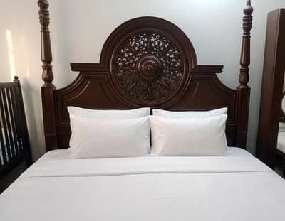 wooden chinioti and carved bed