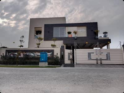 SYED BROTHERS PROUDLY OFFERS: 1-Kanal Elegant And Fully Maintained Modern Brand New Bungalow Is Available In The Best Block Of DHA Lahore.