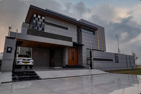 SYED BROTHERS PROUDLY OFFERS: 1-Kanal Elegant And Fully Maintained Modern Brand New Bungalow Is Available In The Best Block Of DHA Lahore.