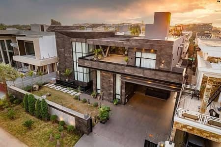 SYED BROTHERS PROUDLY OFFERS: 2-Kanal Elegant And Fully Furnished Modern Bungalow with Basement, Swimming Pool, Theatre, Lift etc Is Available In The Best Block Of DHA Lahore.