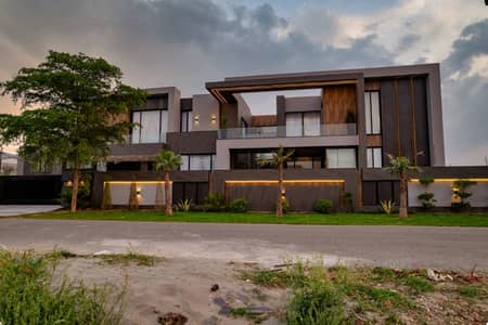 SYED BROTHERS PROUDLY OFFERS: 2-Kanal Elegant And Fully Furnished Modern Bungalow with Basement, Swimming Pool, Theatre, Lift etc Is Available In The Best Block Of DHA Lahore.