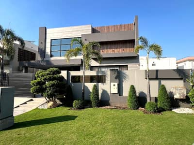 SYED BROTHERS PROUDLY OFFERS: 1-Kanal Elegant And Fully Furnished Modern Bungalow Is Available In The Best Block Of DHA Lahore.