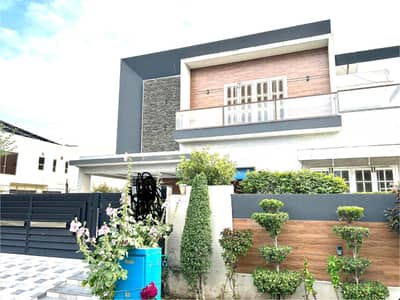 SYED BROTHERS PROUDLY OFFERS: 1-Kanal Elegant Modern Bungalow With Basement Is Available In The Best Block Of DHA Lahore.