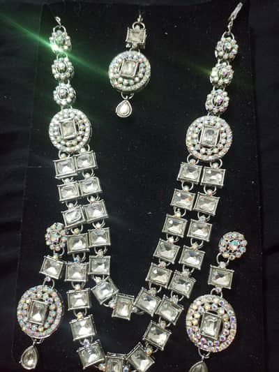 white necklace with earrings