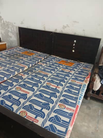 2 Wooden single beds with duraform mattress