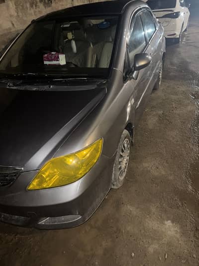 Honda city IDSI ( ST silver colour)