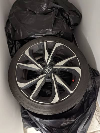 Honda 18 inch rims with low profile tyres.