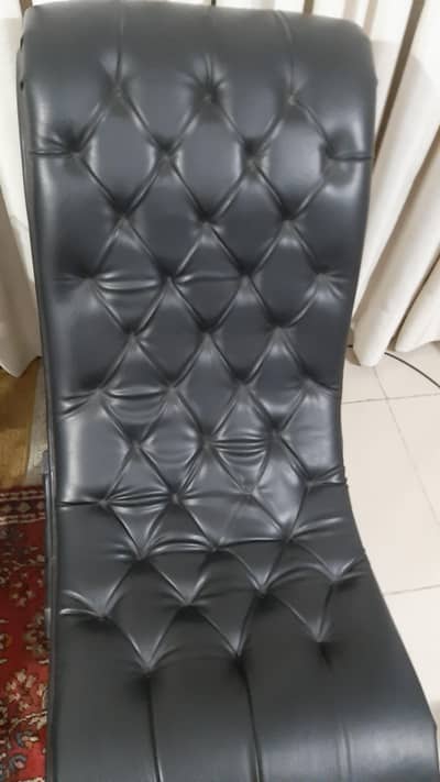 black vintage leather chairs