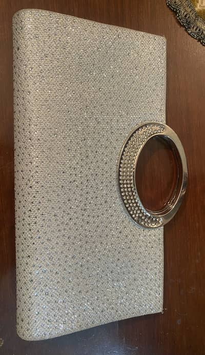Very smart silver formal clutch