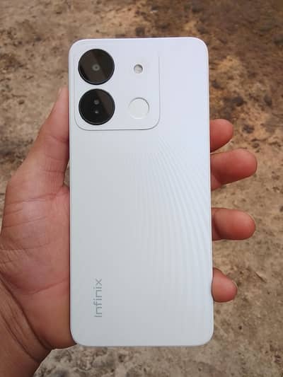 Infinix smart 7 2+2 64 front miner crack