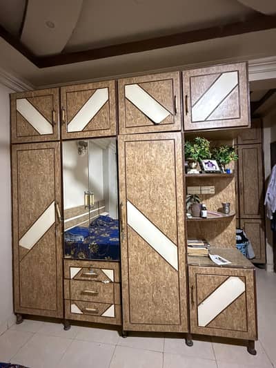 Bed and cupboard