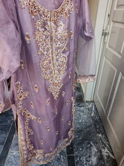 Lavender Embroidered Net Party Wear Kurti with Heavy Zari Work