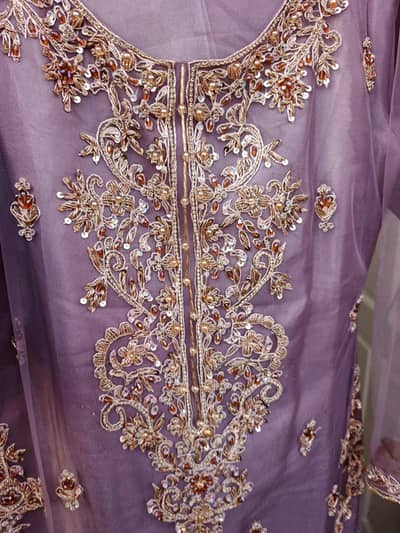 Lavender Embroidered Net Party Wear Kurti with Heavy Zari Work
