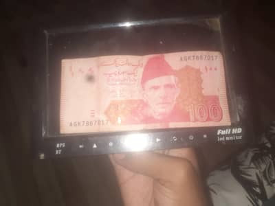 100 rupees note with a golden number of 786