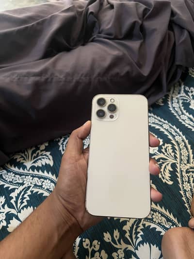 I phone 12 pro max 128 battery change 100 health