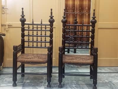 Traditional handcrafted carved wooden chairs