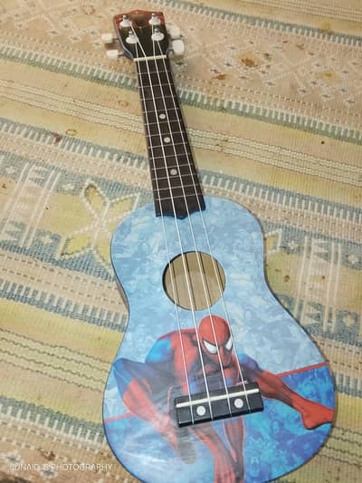 small kids guitar in 10/10 condition little bit used