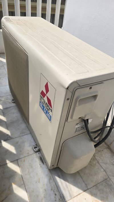 Mr. Slim Mitsubishi  2 ton excellent condition np fault