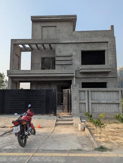 10 Marla Grey Structure Triple Story Modern Design House LDA APPROVED