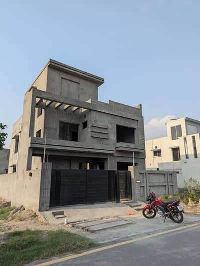 10 Marla Grey Structure Triple Story Modern Design House LDA APPROVED