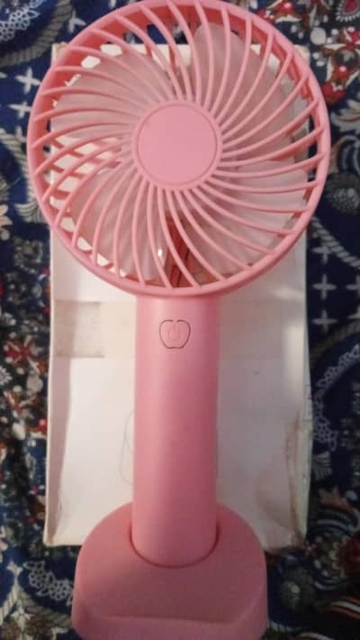 Portable handy cooling fan with rechargeable battery
