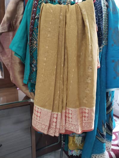 zabrdast party wear  saree  silk  or georget type