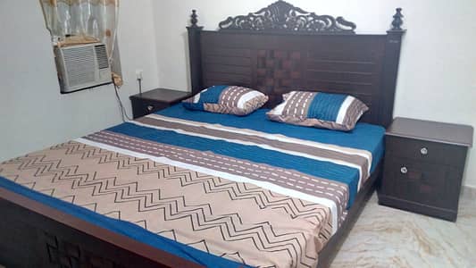 Furnished Independent Flat/ Apartment with fuuly tiled and marble 2 Rooms for Rent in Q Block Model Town Lahore with AC, Fridge, LED TV, Curtain, Stove, Beds, wood work, UPS, Kitchen & bath room Rent = 36000