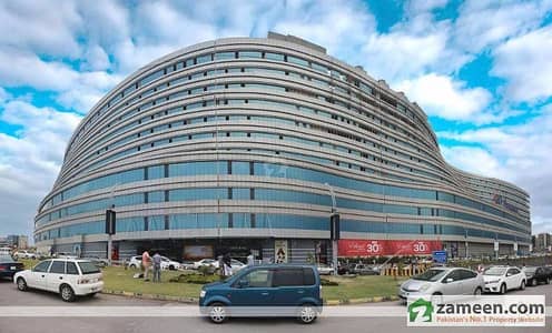 Leased Shop (Halal Rental Income) for Sale in World Trade Centre - Giga Mall DHA2 Islamabad. Brand Leased | Investor Price | Prime Location on main GT Road | best Rental Income Opportunity.